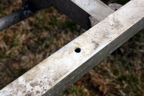 Rivet hole after removal.